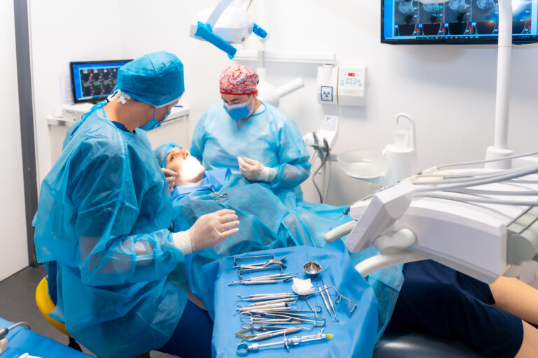 Dental clinic, dentist doctor preparing all the utensils before the operation